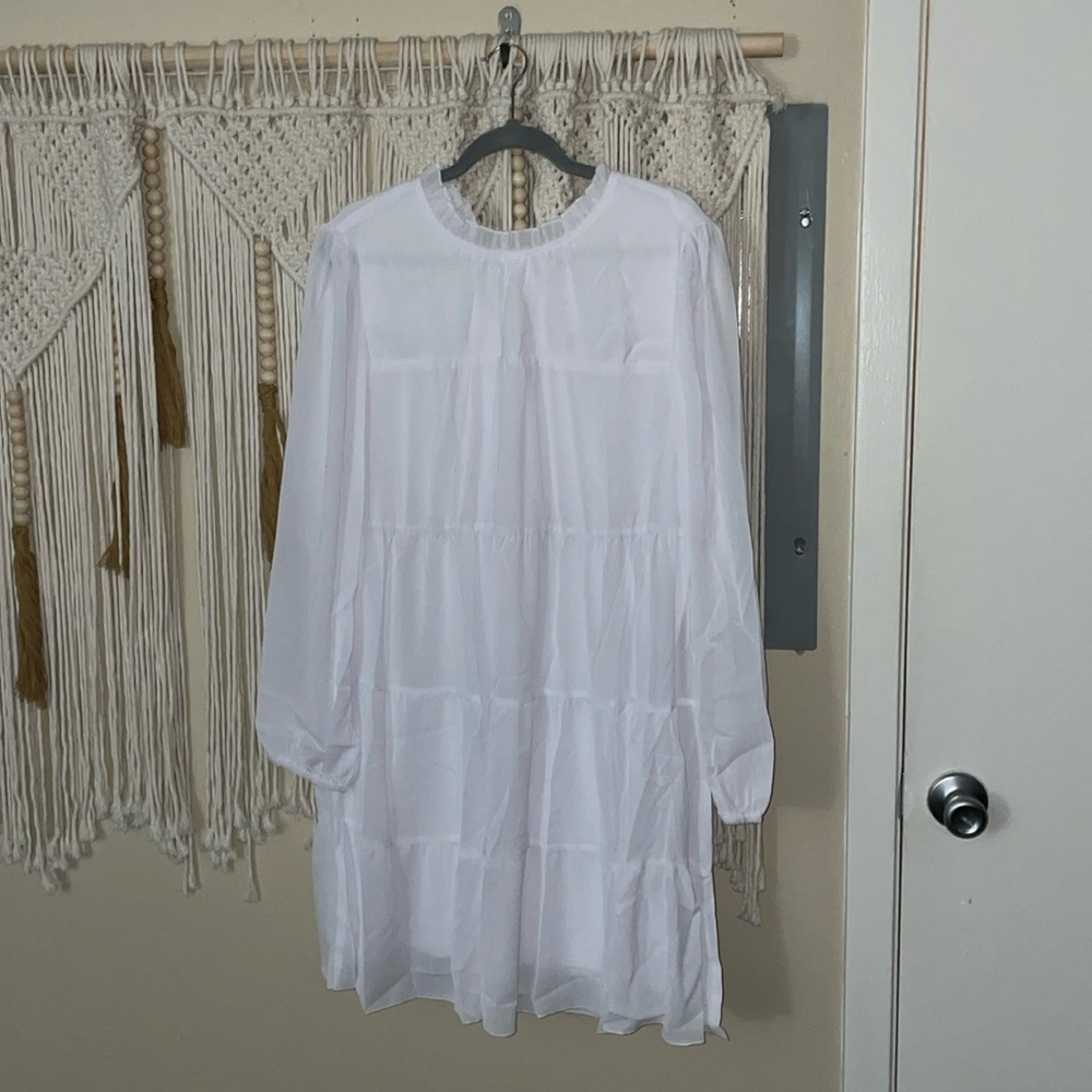 white high neck dress with bow in back